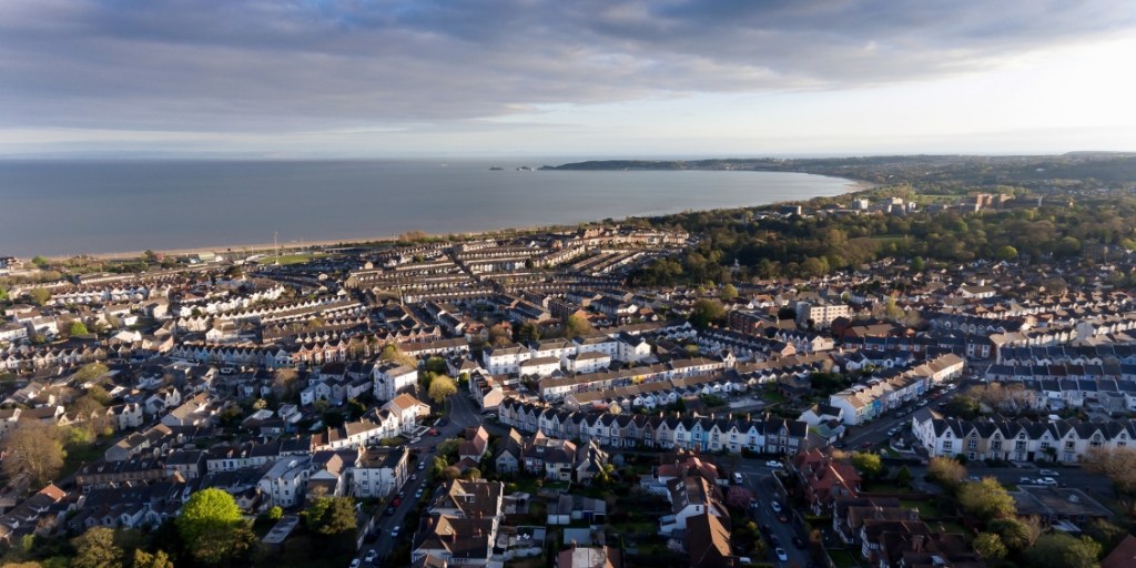 Ariel photo capturing a residential area of Swansea, Wales, close to the sea